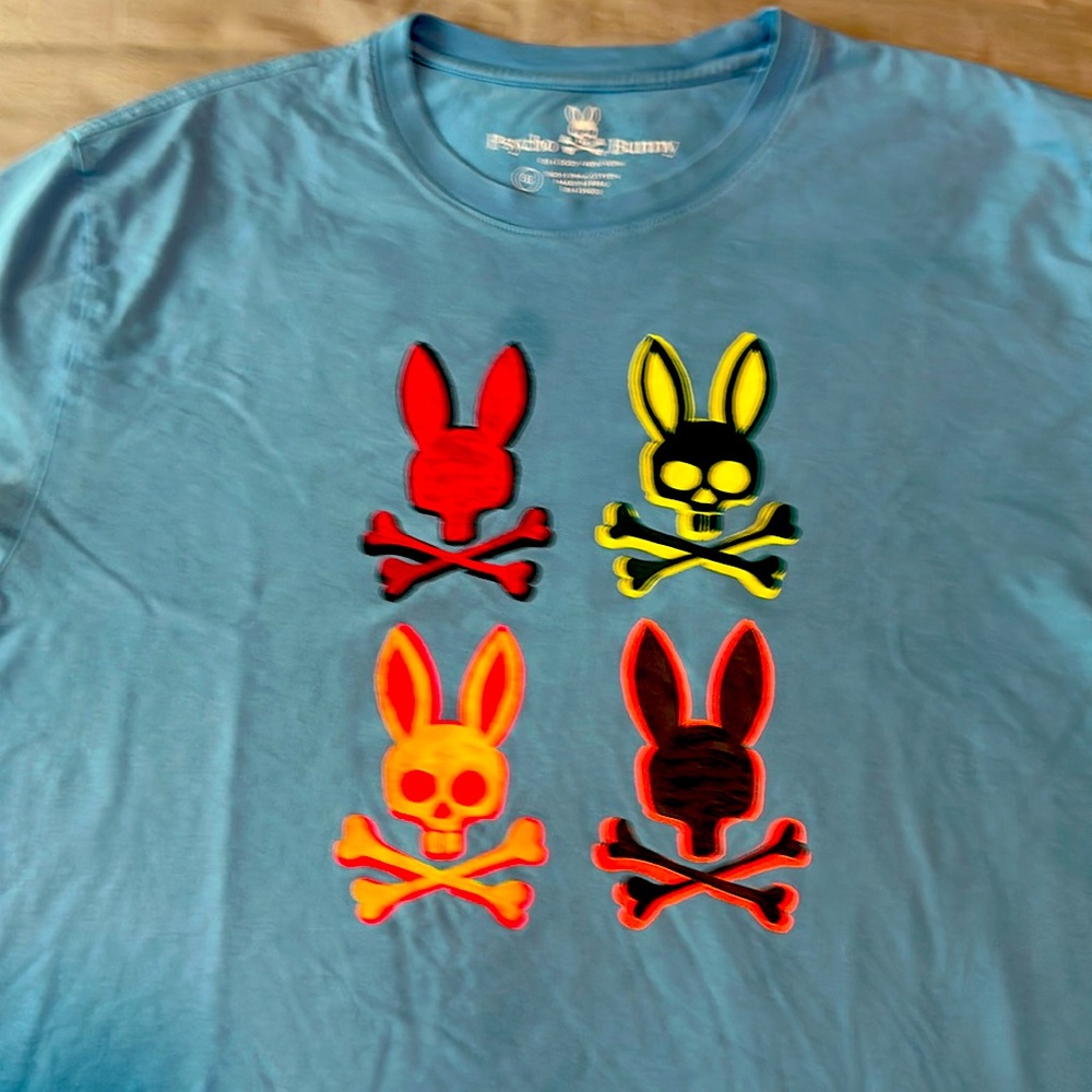 Psycho bunny size 8/XL bunny logo on front Tshirt